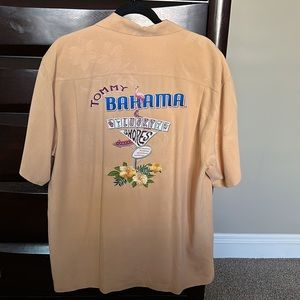 Tommy Bahama 100% silk golden yellow shirt. Graphic as shown. Size L.